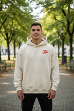 "Mann trägt beige farbenen Hoodie Team Jesus"
